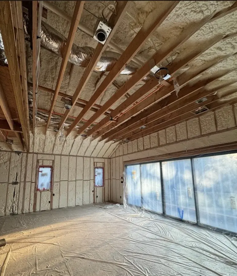 Interior walls and ceiling insulated with spray foam during new construction in Waterford